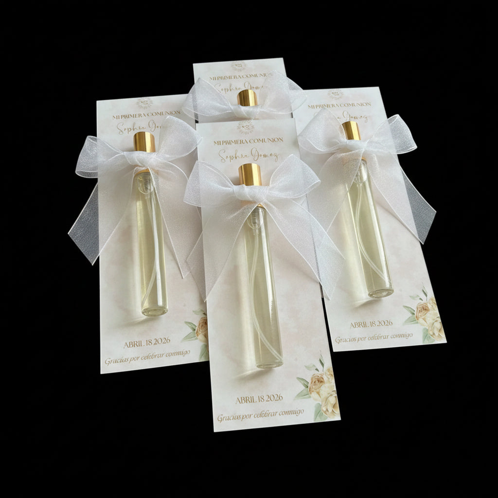 Two perfume bottles in gift packaging with decorative ribbons on a textured surface with flowers.